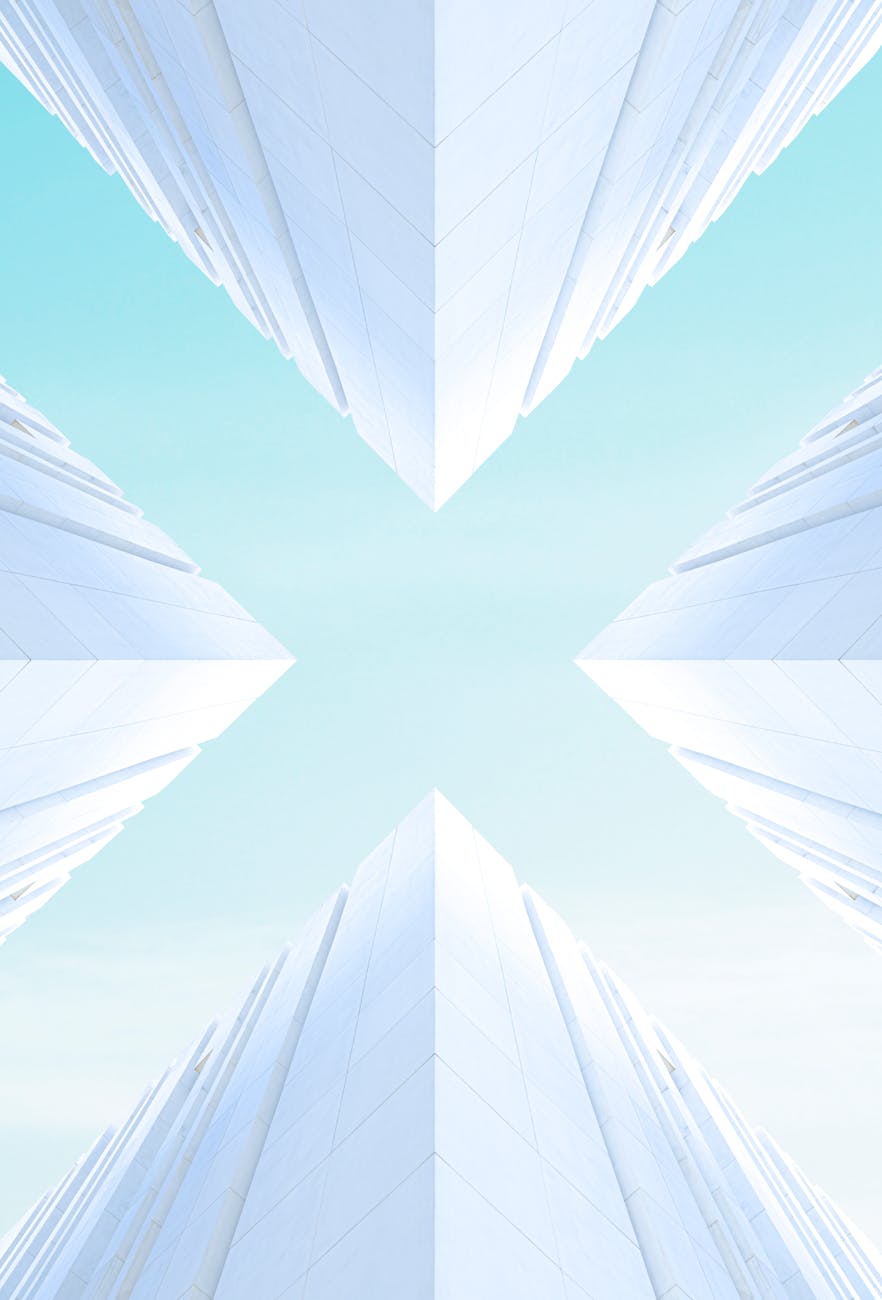 Stunning upward view of modern architecture in Rabat, Morocco, showcasing symmetry and minimalism.